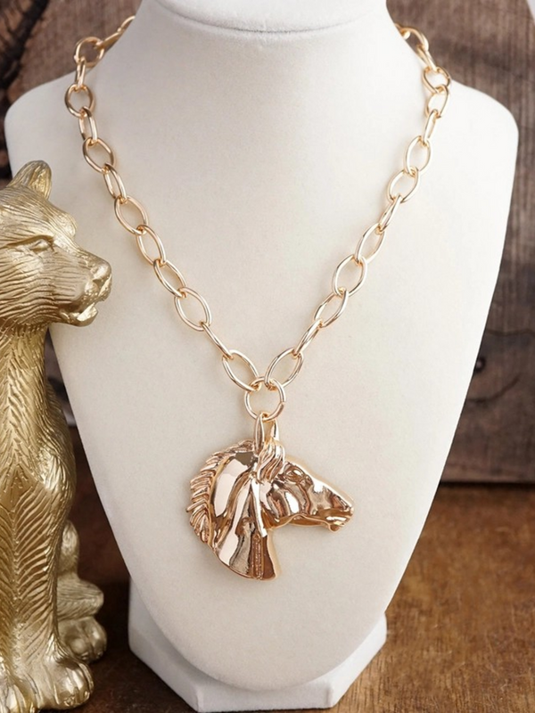 gold tone sculpted horse pendant necklace