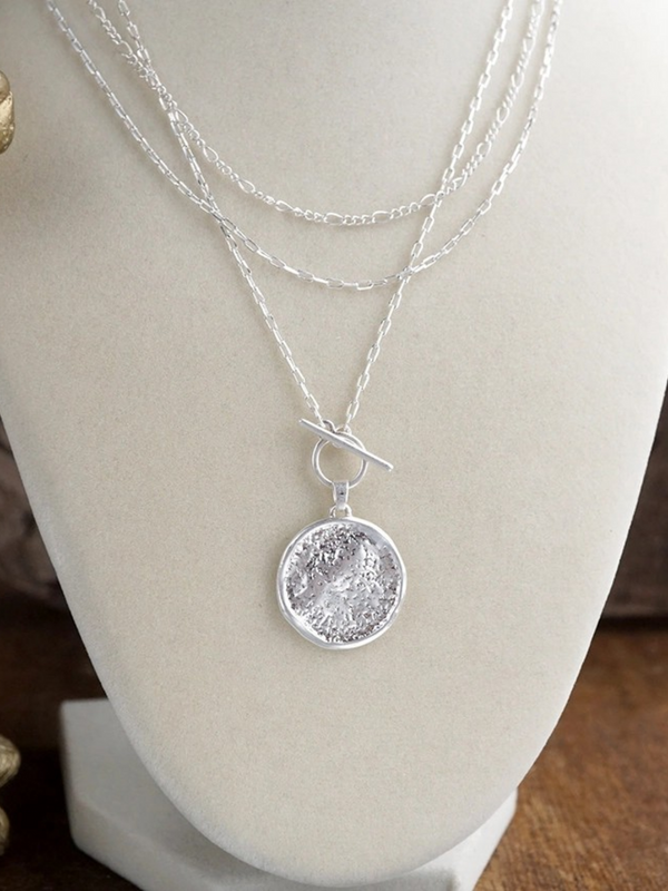 silver tone moon phase relic layered coin togglr necklace