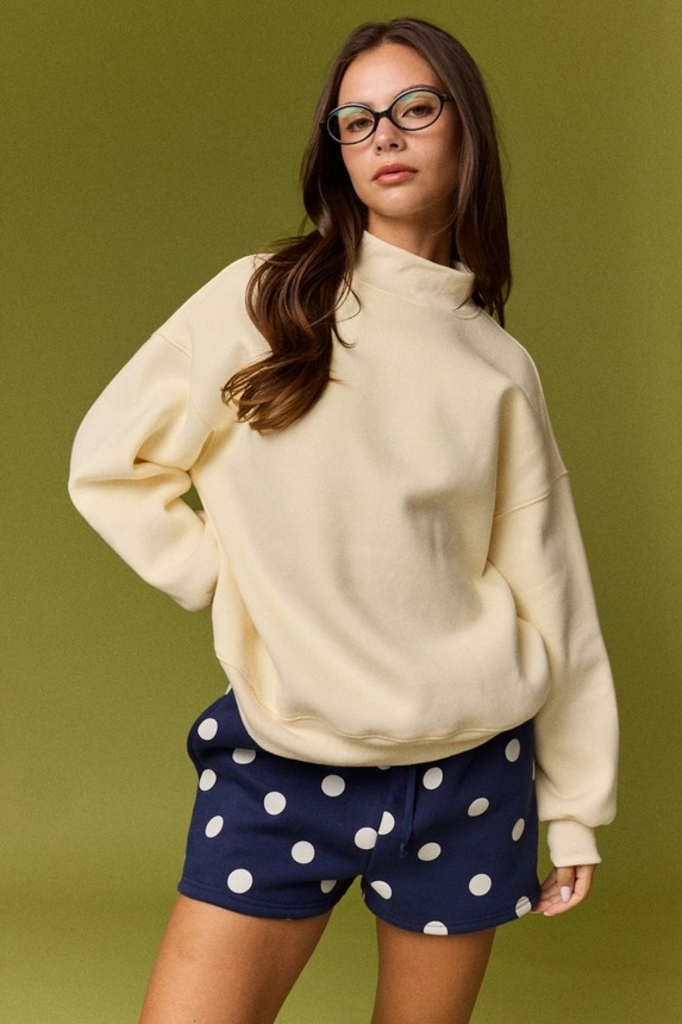 light yellow mock neck sweater