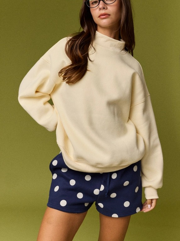 light yellow mock neck sweater
