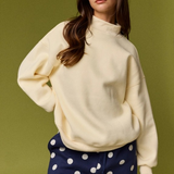 light yellow mock neck sweater