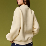 light yellow mock neck sweater