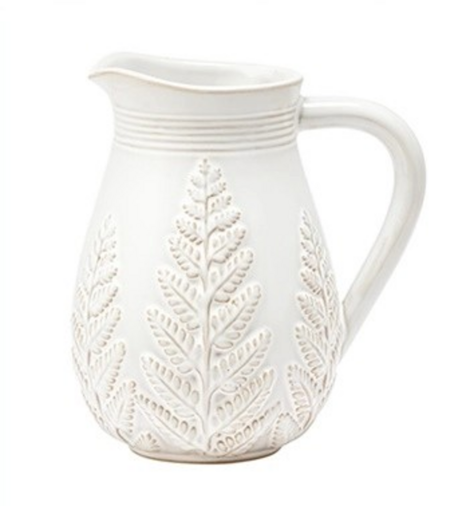 white pitcher with fern design