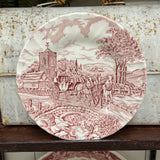 brown and red horse and carriage plate
