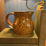 Neutral pottery pitcher