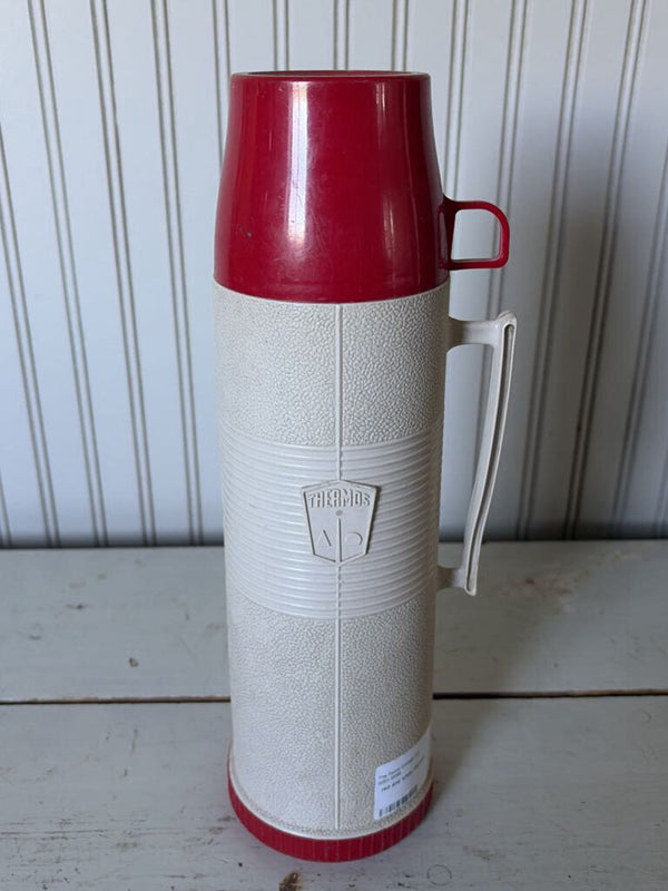 red and white thermos