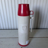 red and white thermos