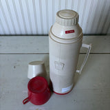 red and white thermos