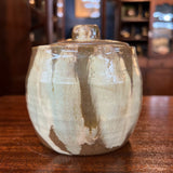 Handmade lidded petite pottery vessel