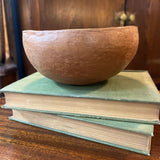 Handmade red clay pottery bowl with char