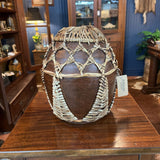 Rattan wrapped red clay pottery vessel