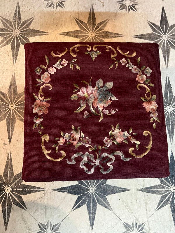 Burgundy floral needlepoint stool