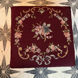 Burgundy floral needlepoint stool