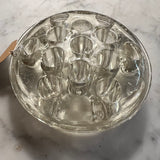 Hefty glass flower frog with edge