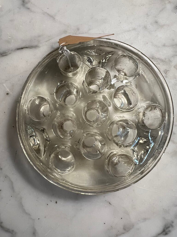 Hefty glass flower frog with edge