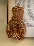 Old copper jello mold