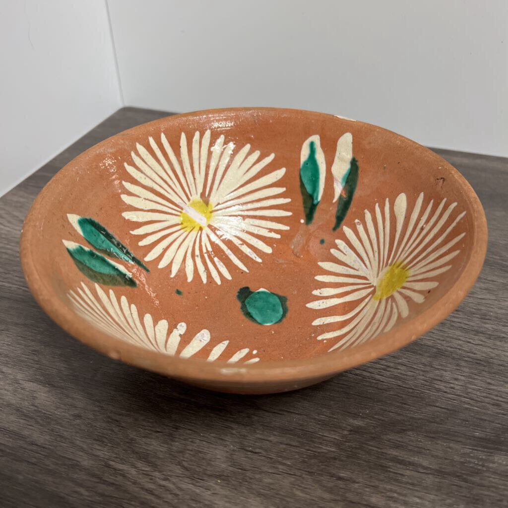 terracotta bowl with flower pattern
