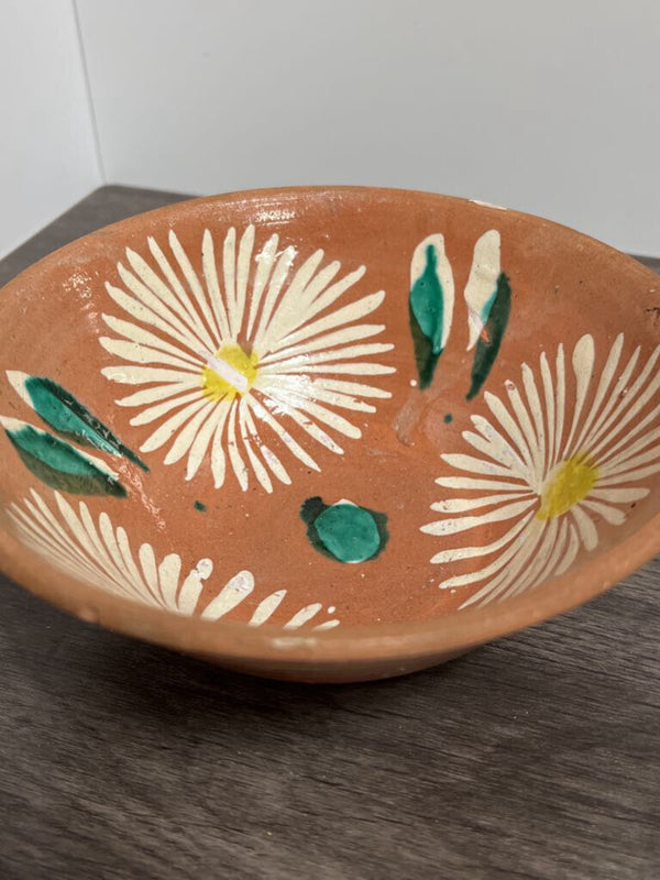 terracotta bowl with flower pattern