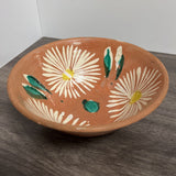terracotta bowl with flower pattern