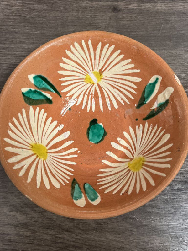 terracotta bowl with flower pattern