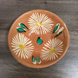 terracotta bowl with flower pattern