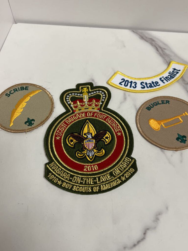 assortment of badges