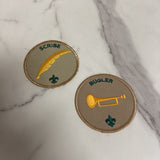assortment of badges