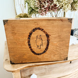 Wooden box with horse carving