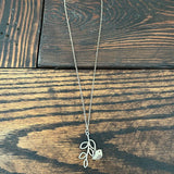 Bird on branch necklace