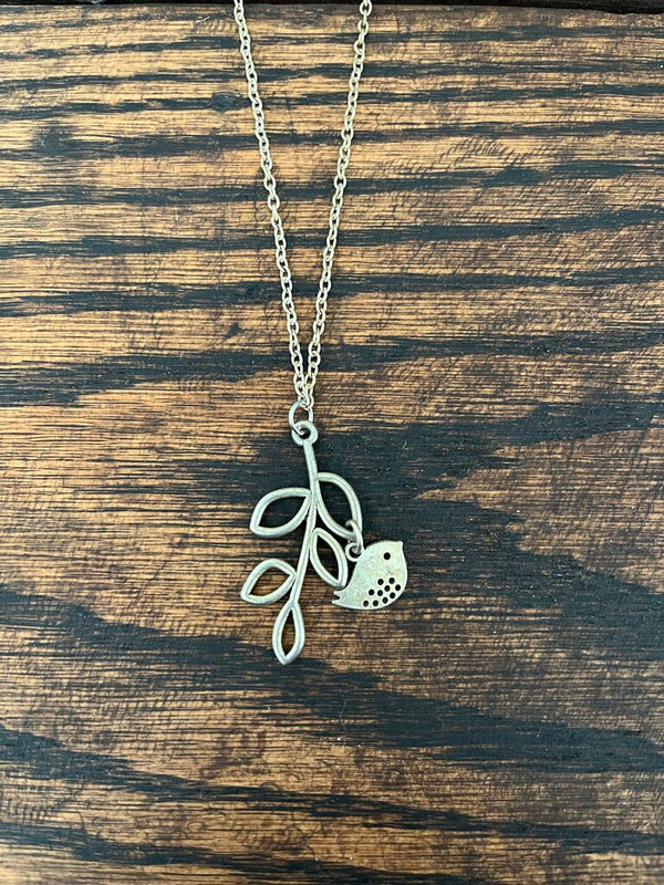 Bird on branch necklace