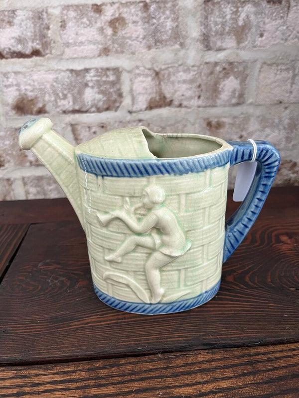 Ceramic watering can