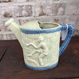 Ceramic watering can