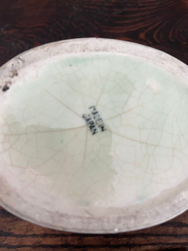 Ceramic watering can