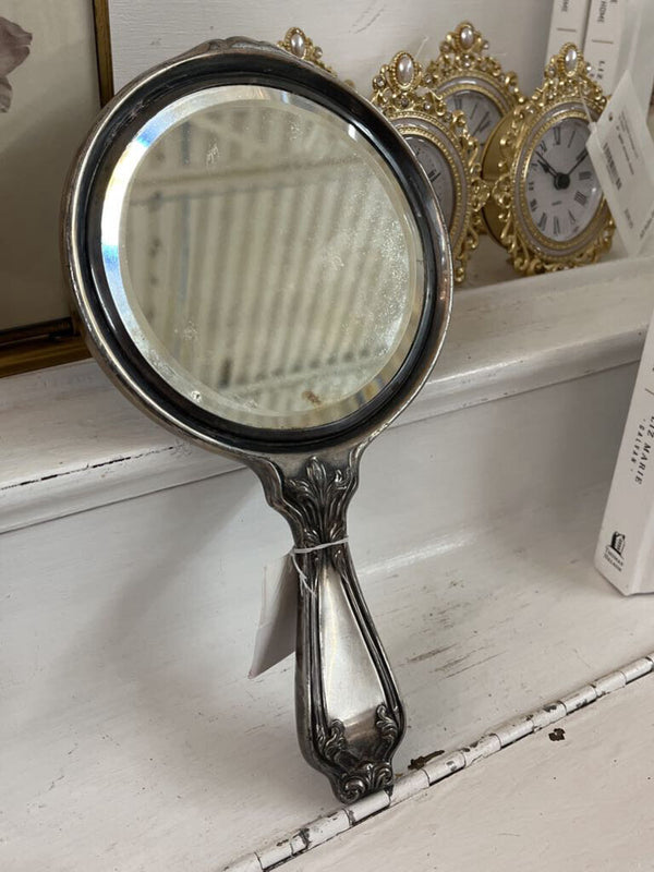 silver hand mirror
