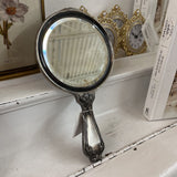 silver hand mirror