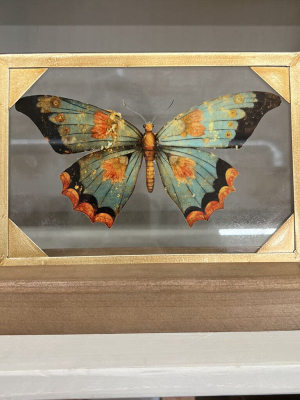 green butterfly glass and wood decor