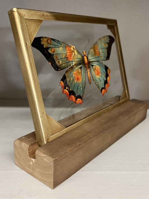 green butterfly glass and wood decor