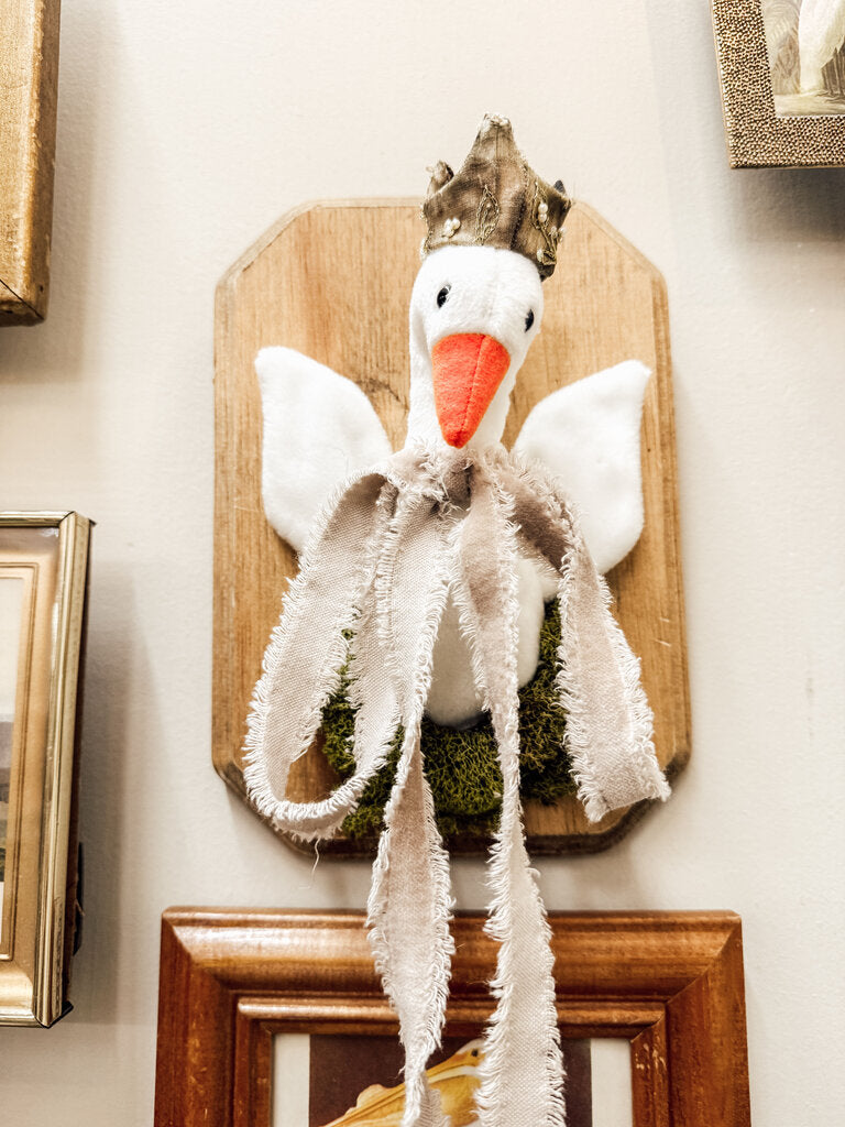 Taxidermy swan with crown