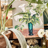 Painting of moonflowers in green vase