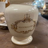 small white and gold urn with lid