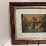 antique cherub swan framed art