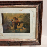 antique cherub swan framed art