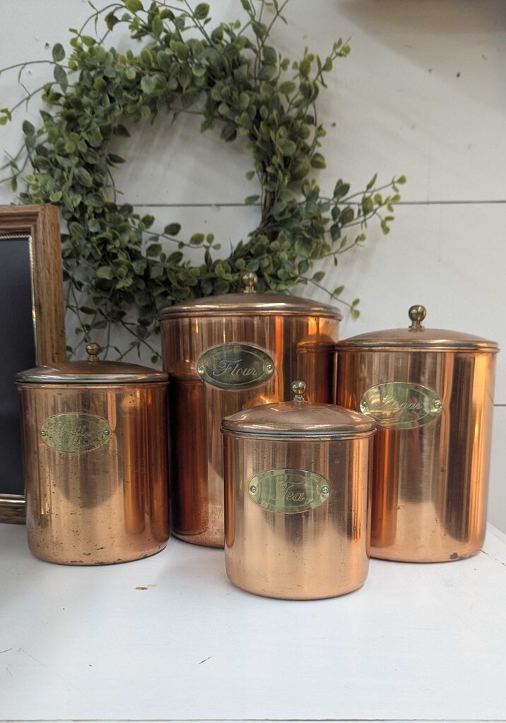 Set of 4 vintage nesting copper canisters