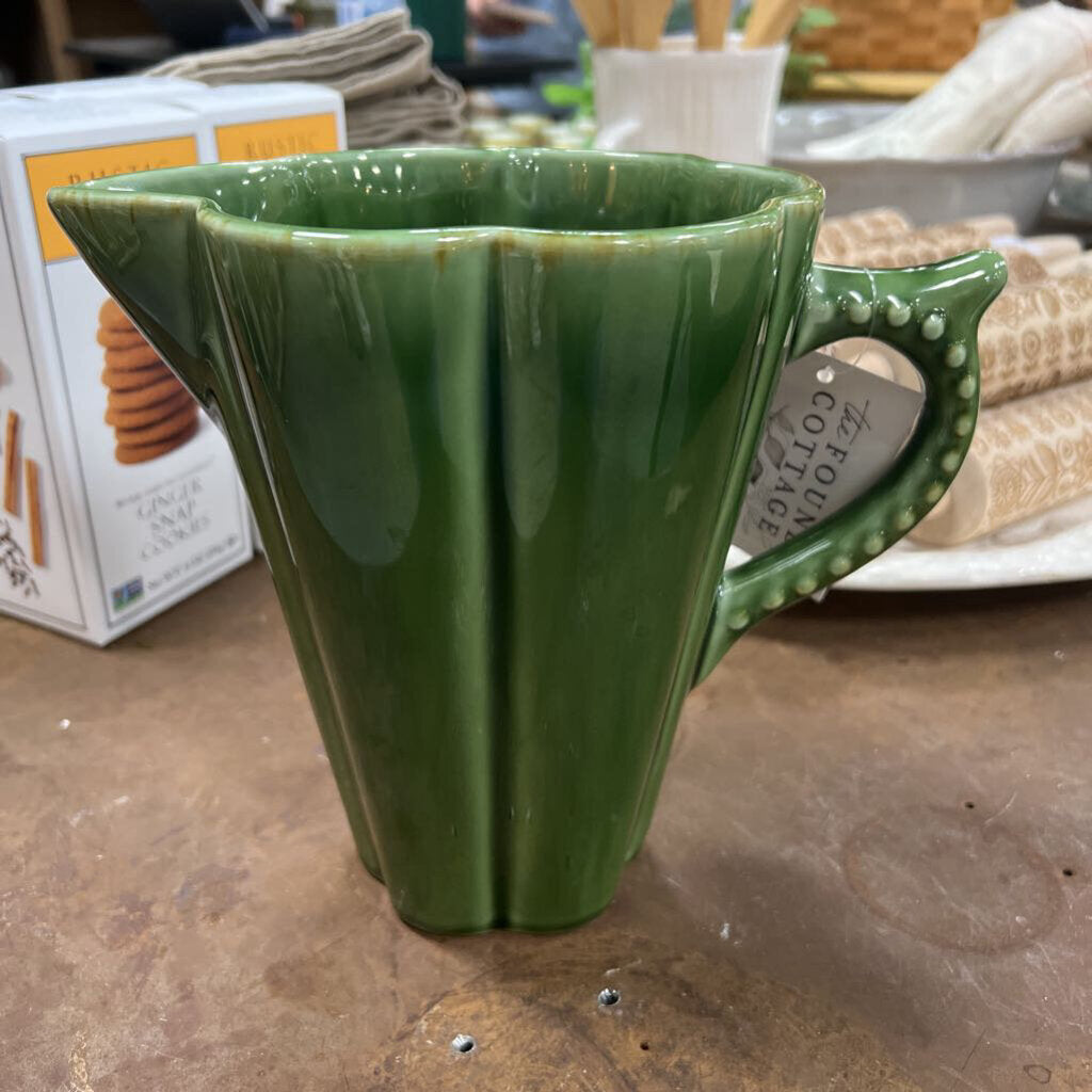 green ribbed pottery pitcher