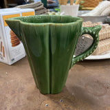 green ribbed pottery pitcher