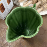 green ribbed pottery pitcher