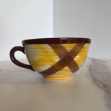brown and yellow plaid mug
