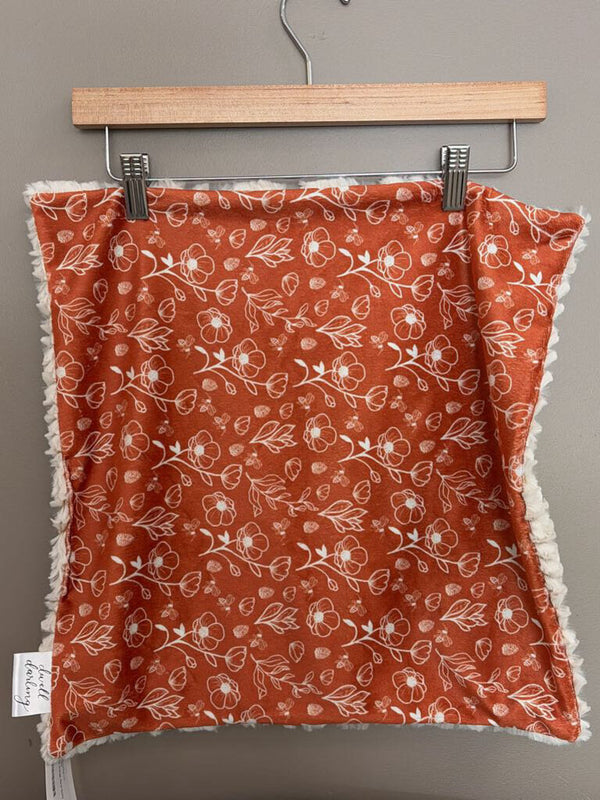 Burnt orange floral lovey