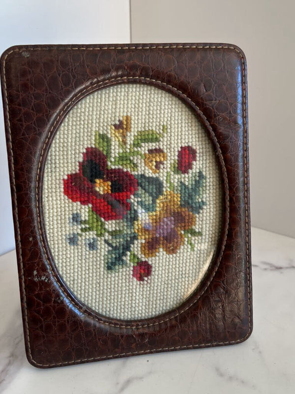 leather frame with floral cross stitch