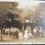 black and white family with dog photo on board (10x8)